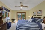 The upstairs master suite is perfect with its flat screen TV and lake views.
